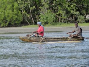 locals on dugout vanuatu